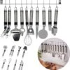 Cheqo® Ophangbare Keukengerei - RVS Keukengerei Met Houder - Keukenset Muurhouder - Ophangrek Met Haken - Met Blikopener - Kaasschaaf - Garde - Flessenopener - Dunschiller - Schilmes - Pizzaroller - Knoflookpers - 9 Delig